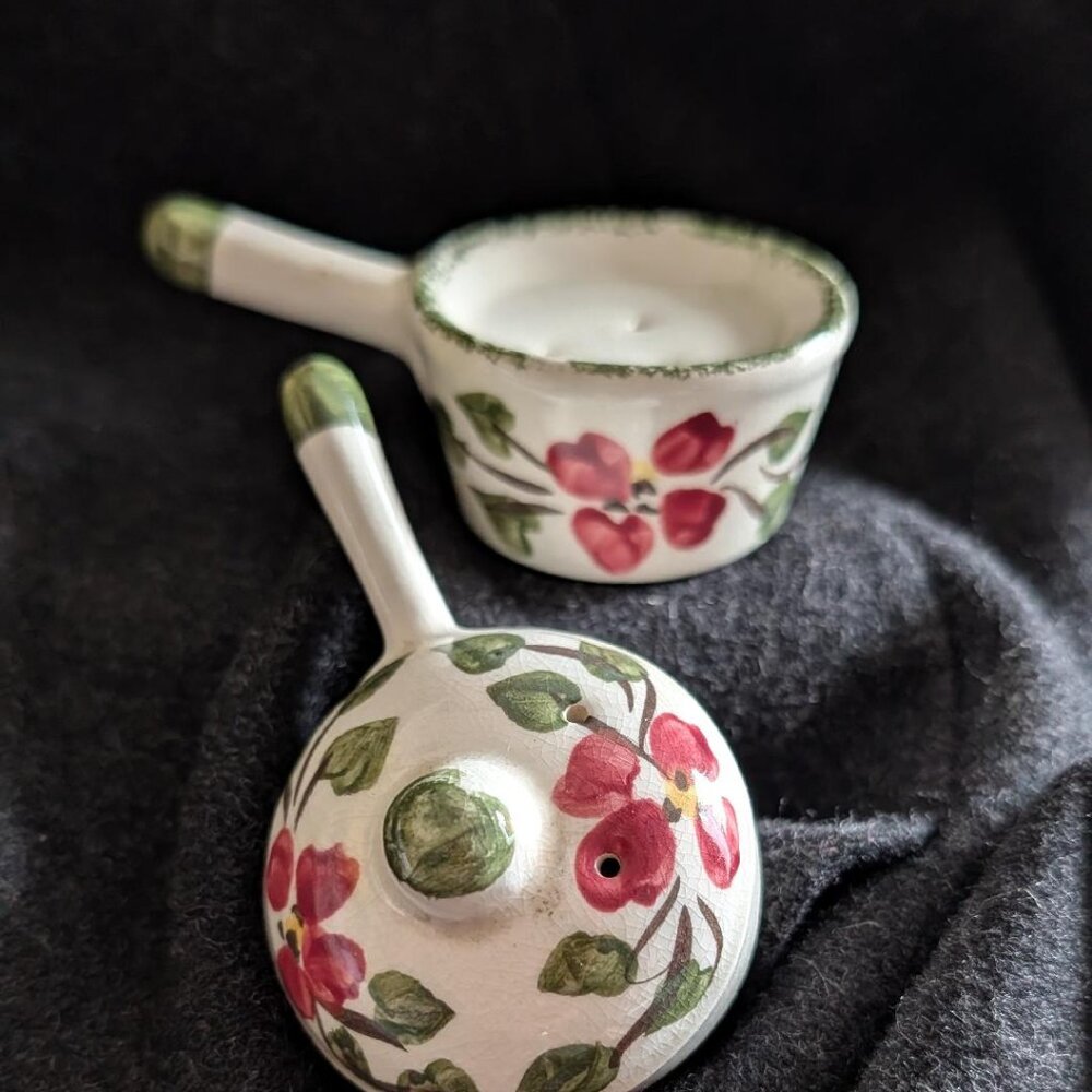 Ceramic salt and pepper shaker set with hand-painted floral design